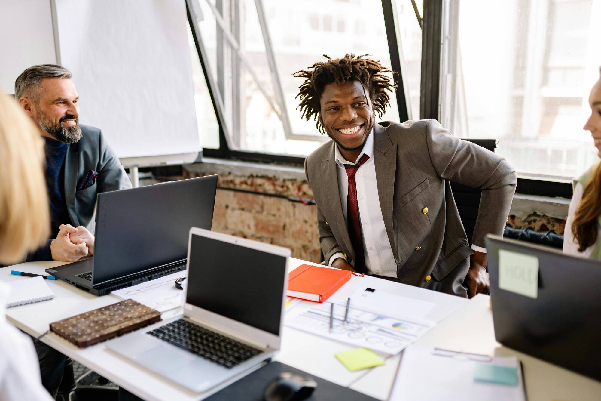 African American Male in Suit in Meeting